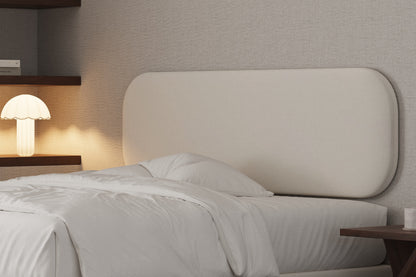 Above wall hung headboard